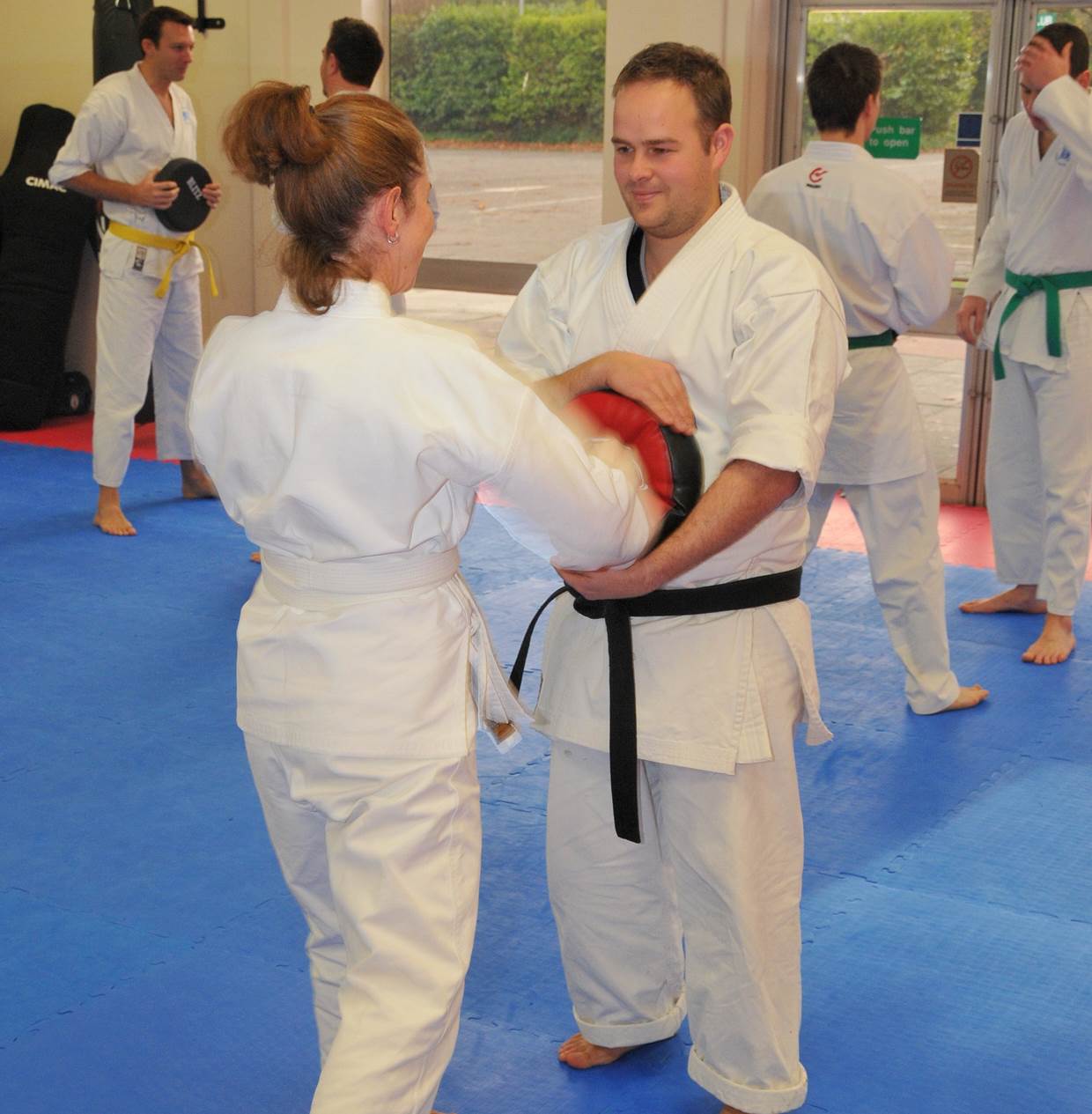 Photo of man and woman in Karate Class