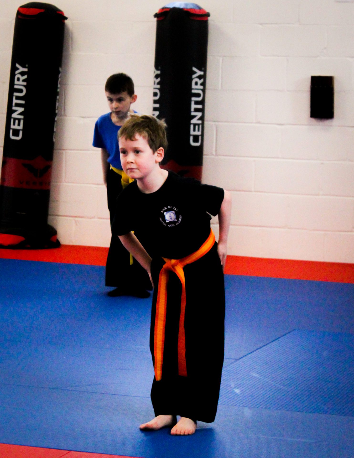 Photo of young martial artist bowing