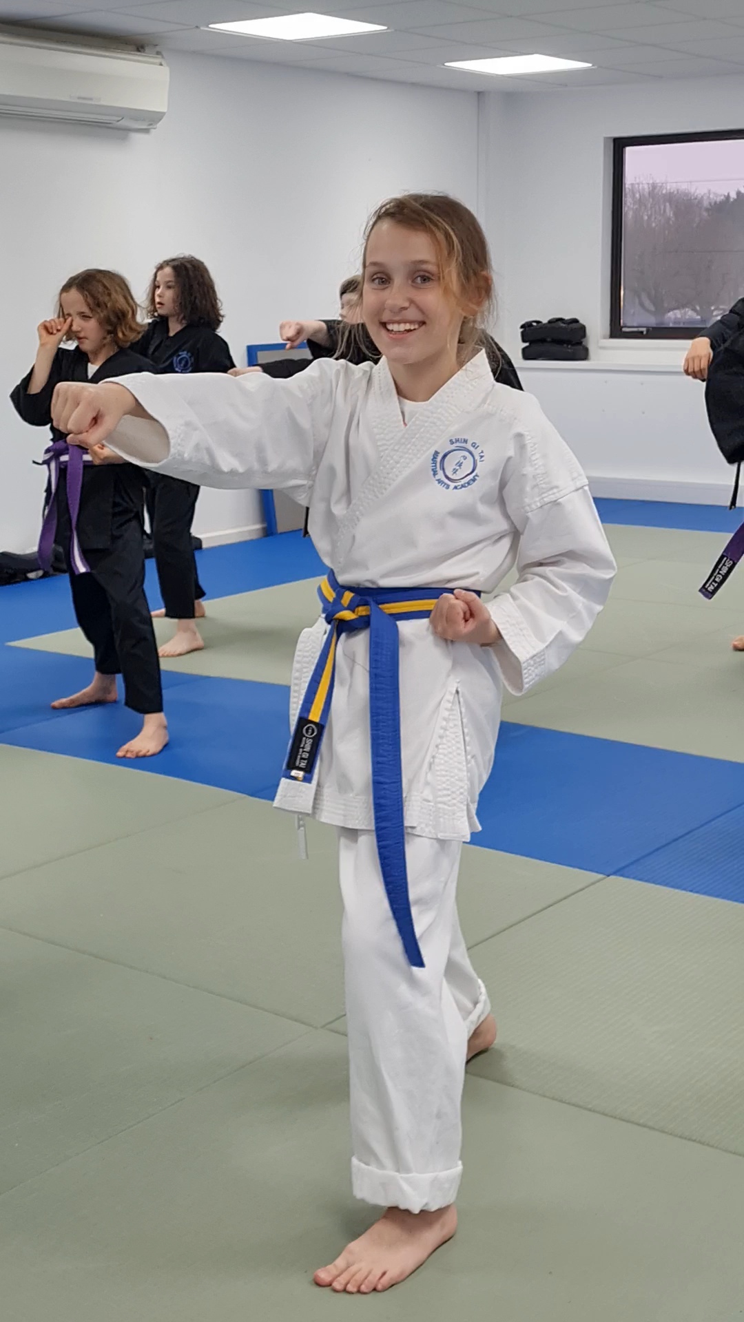 Girl learning martial arts in a class in Basingstoke